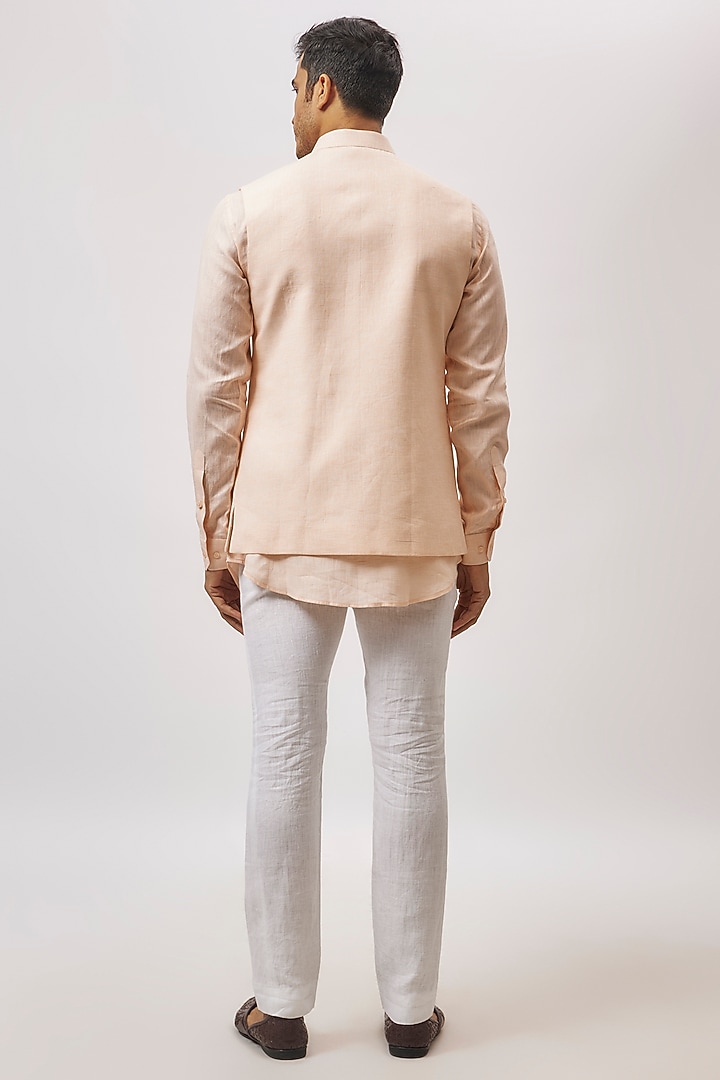 Peach Linen hand Embroidered Bundi Jacket Set by Nero By Shaifali & Satya at Pernia's Pop Up Shop