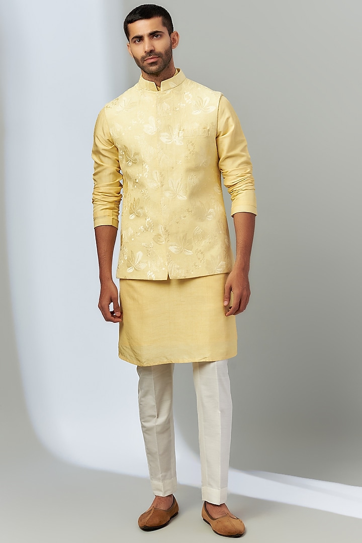 Yellow Dupion Silk Embroidered Bundi Jacket Set by Nero by Shaifali & Satya