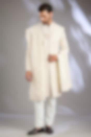 Ivory Silk Handwork Groom Sherwani Set by Nero By Shaifali & Satya at Pernia's Pop Up Shop