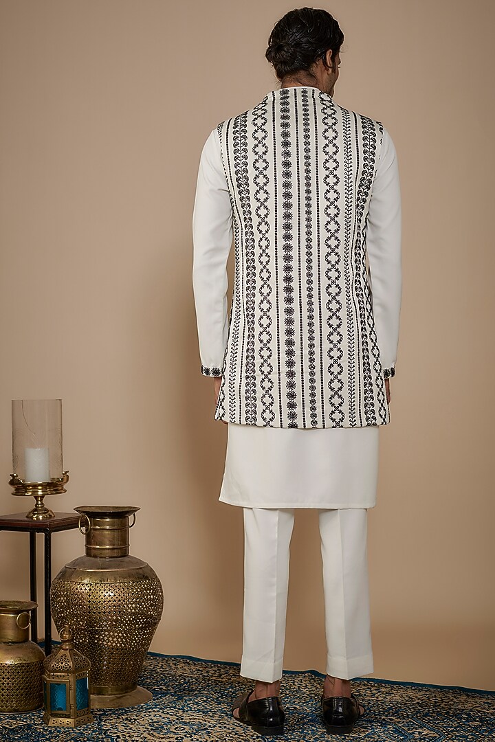 White Silk Thread Embroidered Bundi Jacket Set by Nero by Shaifali & Satya at Pernia's Pop Up Shop