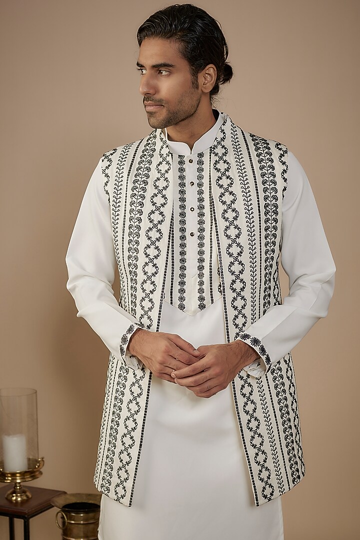 White Silk Thread Embroidered Bundi Jacket Set by Nero by Shaifali & Satya at Pernia's Pop Up Shop