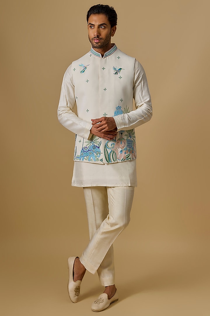 Ivory Boomario Fabric Handwork Bundi Jacket Set by Nero By Shaifali & Satya
