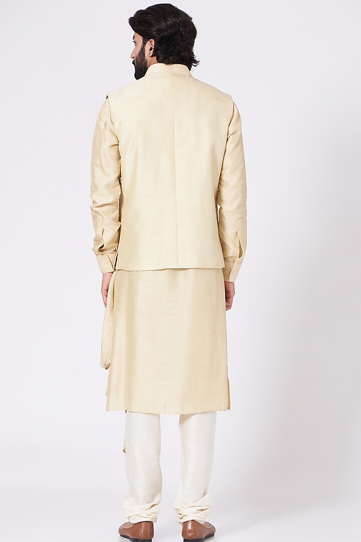 Light Golden Silk Machine Embroidered Bundi Jacket Set by Nero By Shaifali & Satya at Pernia's Pop Up Shop