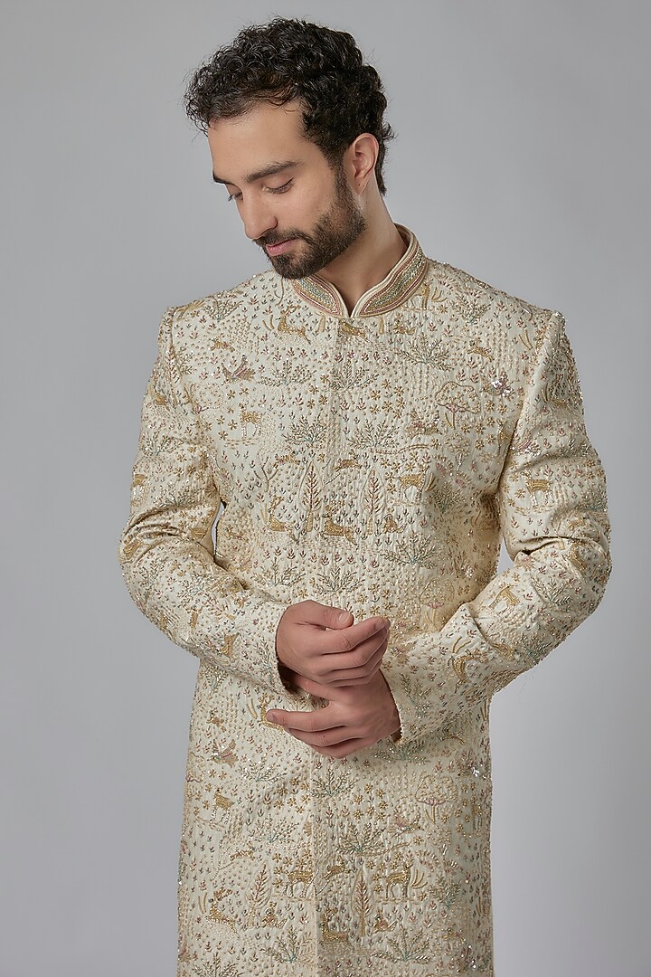 Ivory Dupion Silk Thread Embroidered Groom Sherwani Set by Nero by Shaifali & Satya at Pernia's Pop Up Shop