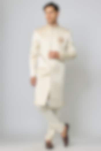 Ivory Tissue Silk Pearl Embroidered Wedding Indowestern Set by Nero By Shaifali & Satya at Pernia's Pop Up Shop