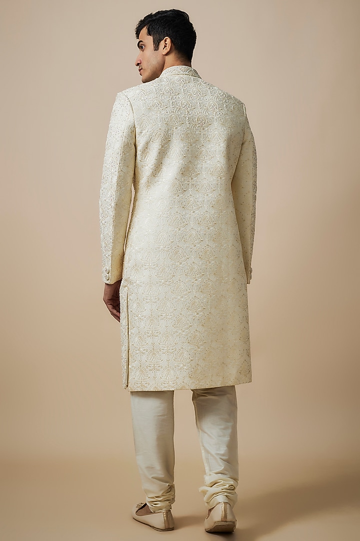 Ivory Silk Hand & Machine Embroidered Wedding Sherwani Set by Nero By Shaifali & Satya at Pernia's Pop Up Shop