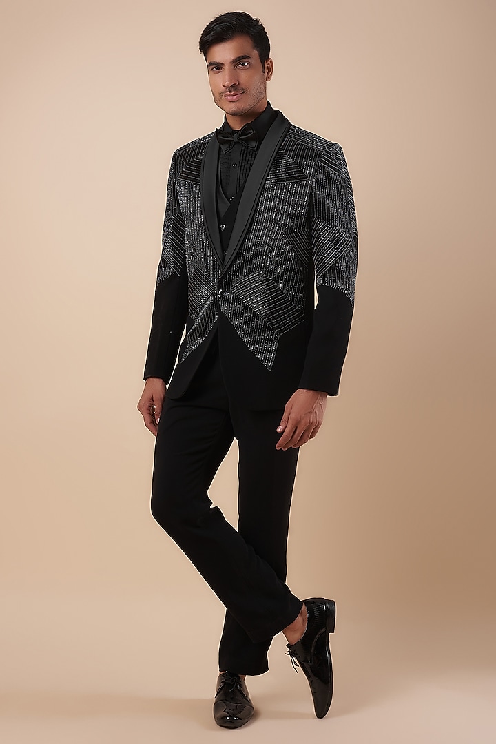Black Suiting Fabric Cutdana & Hand Work Tuxedo Set by Nero by Shaifali & Satya at Pernia's Pop Up Shop