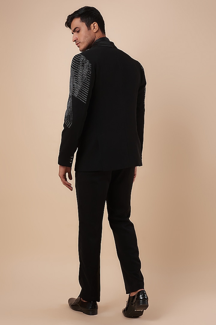 Black Suiting Fabric Cutdana & Hand Work Tuxedo Set by Nero by Shaifali & Satya at Pernia's Pop Up Shop