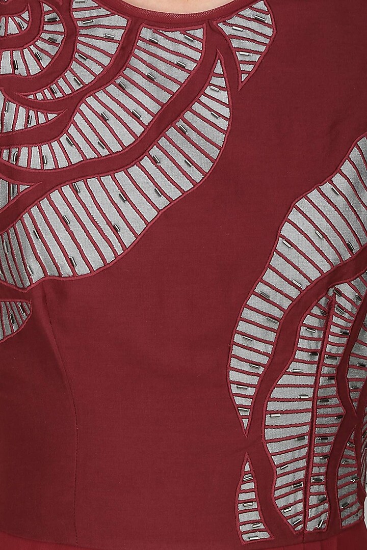 Nachiket Barve presents Maroon thread embroidered cutwork rose motif drape dress available only at Pernia's Pop Up Shop.