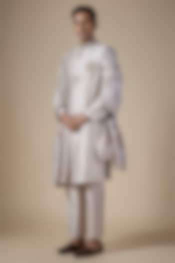 Pink Raw Silk Wedding Sherwani Set by Nero By Shaifali & Satya at Pernia's Pop Up Shop