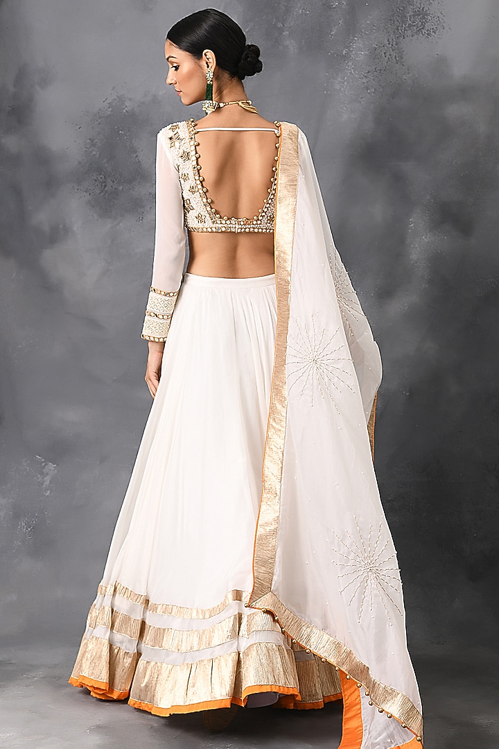 Ivory Wedding Lehenga Set With Gold Finishing by Neha Chopra Tandon at Pernia's Pop Up Shop
