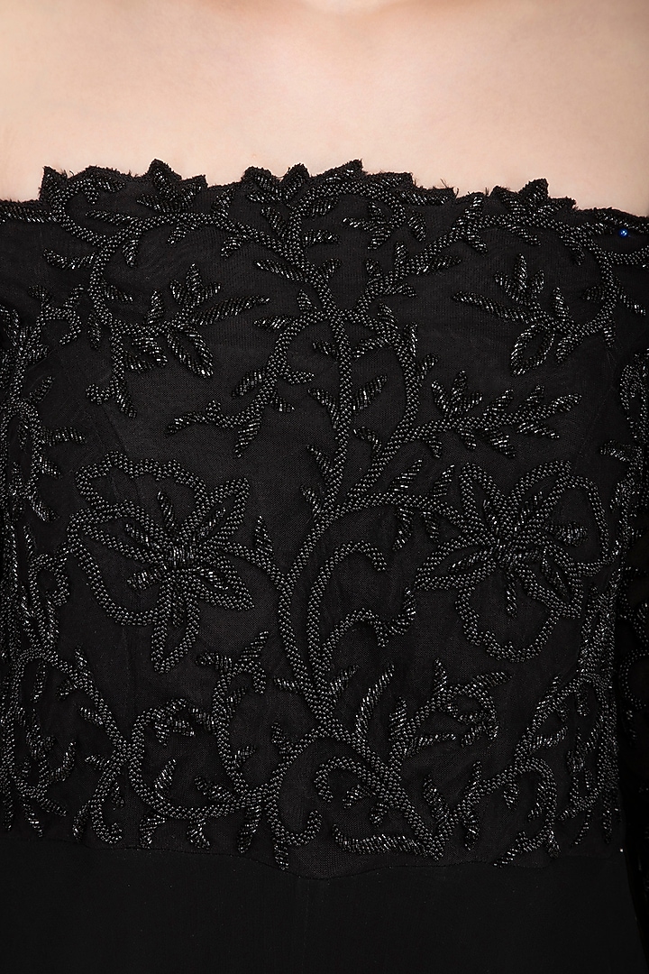 Black Embellished Off Shoulder Flared Jumpsuit by Neha Chopra Tandon at Pernia's Pop Up Shop