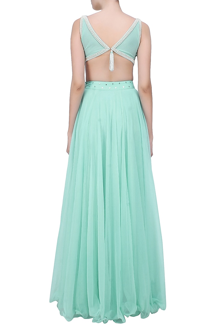 Baby blue pearls and sequins embellished crop top and flared lehenga set available only at Pernia's Pop Up Shop.