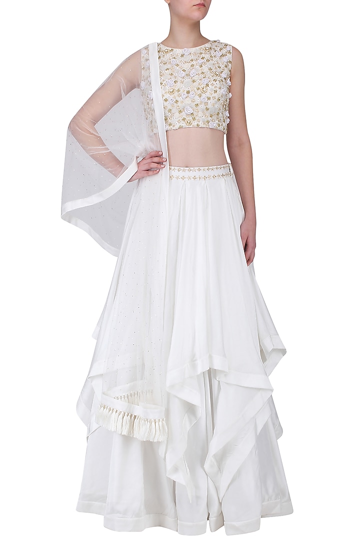 White and gold embroided layered lehenga set available only at Pernia's Pop Up Shop.