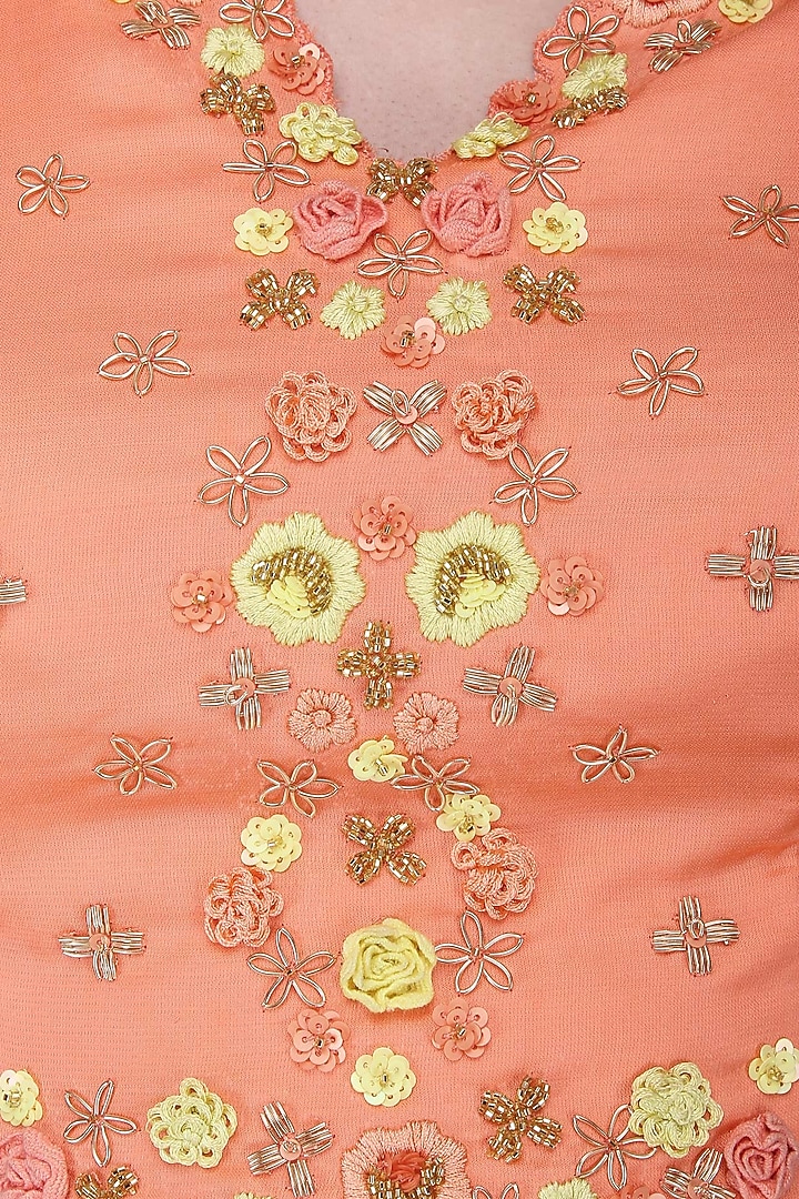 Peach embroidered layered lehenga set available only at Pernia's Pop Up Shop.