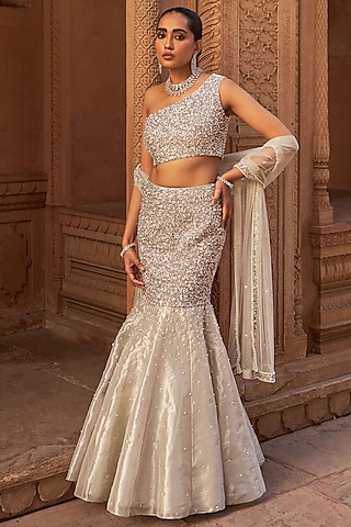 Silver Tissue Sequins Embroidered Fish-Cut Lehenga Set by Nidhika Shekhar