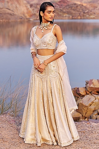 Golden Brocade Sequins Embellished Lehenga Set by Nidhika Shekhar