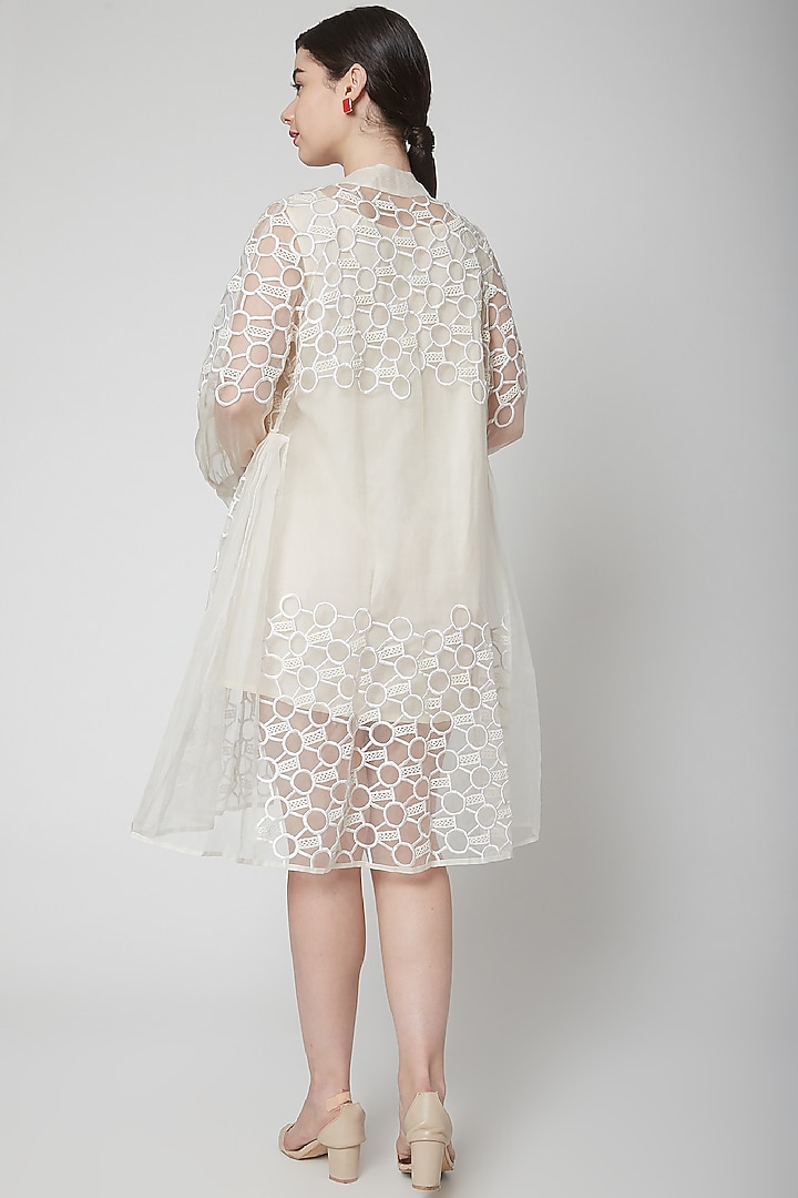 White Thread Embroidered Cape Jacket by Nidhika Shekhar at Pernia's Pop Up Shop