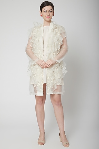 White Cape Jacket With Ruffles by Nidhika Shekhar