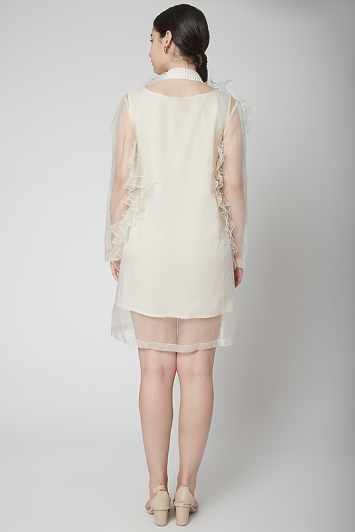 White Cape Jacket With Ruffles by Nidhika Shekhar at Pernia's Pop Up Shop