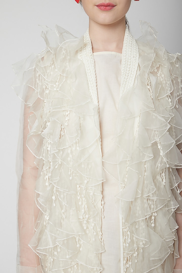 White Cape Jacket With Ruffles by Nidhika Shekhar at Pernia's Pop Up Shop