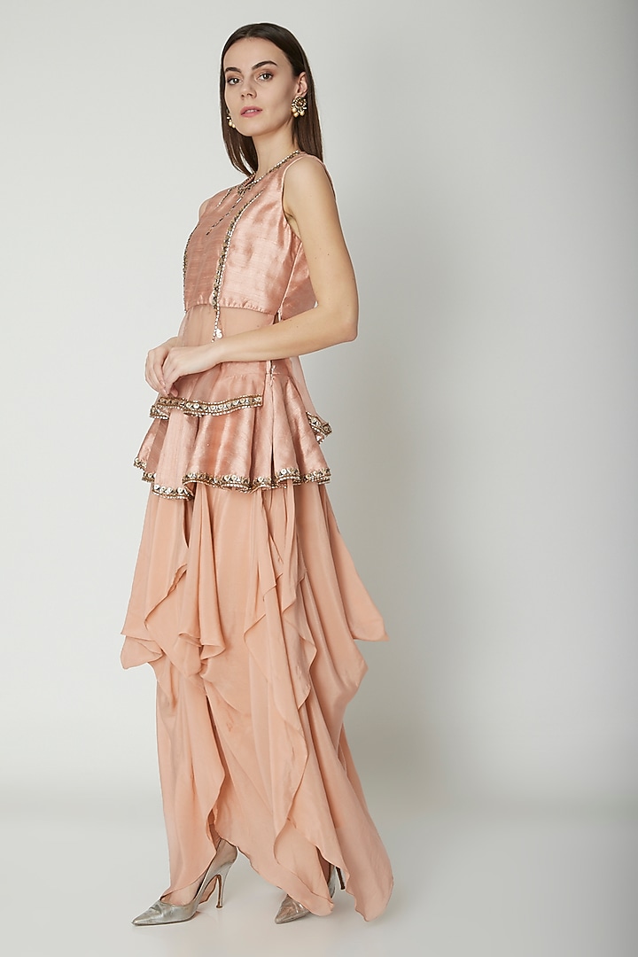 Blush Pink Embroidered Peplum Top With Skirt by Nidhika Shekhar at Pernia's Pop Up Shop