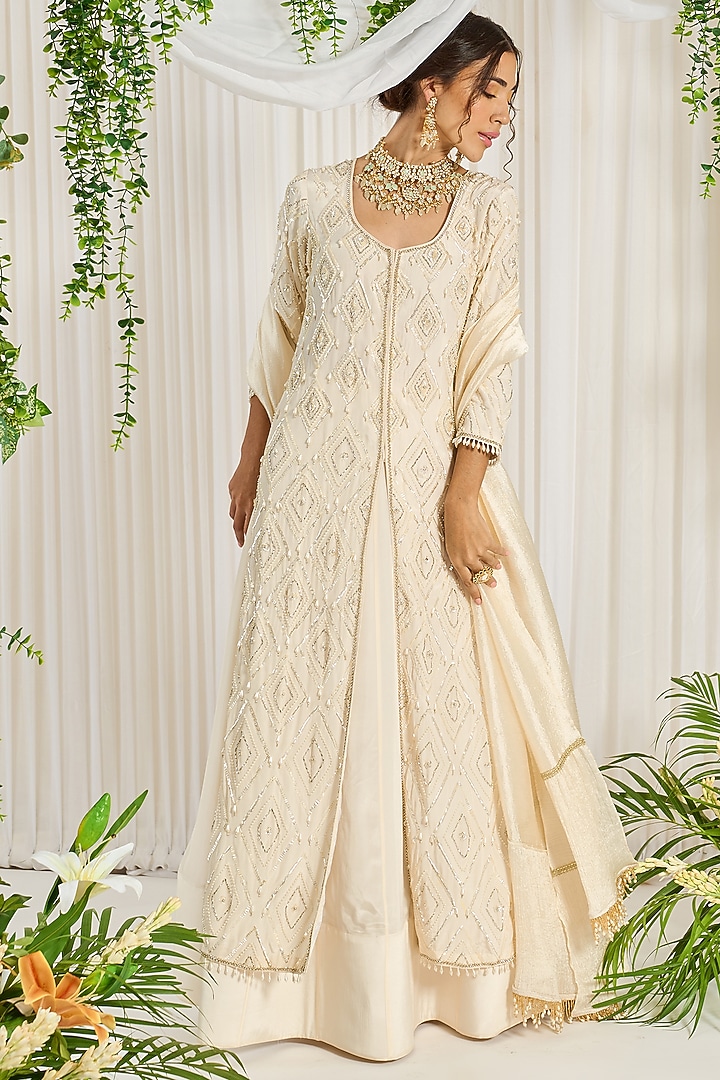 Ivory Wedding Lehenga Set With Hand Embroidery by Nidhika Shekhar at Pernia's Pop Up Shop