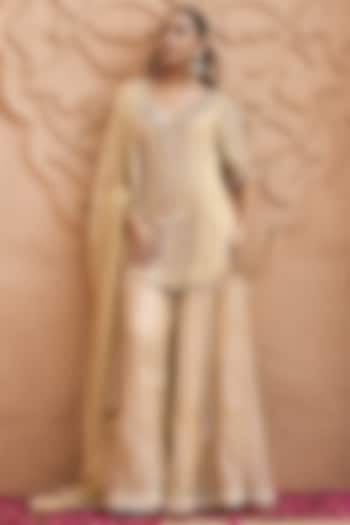 Champagne Gold Tissue Bridal Sharara Set by Nidhika Shekhar at Pernia's Pop Up Shop