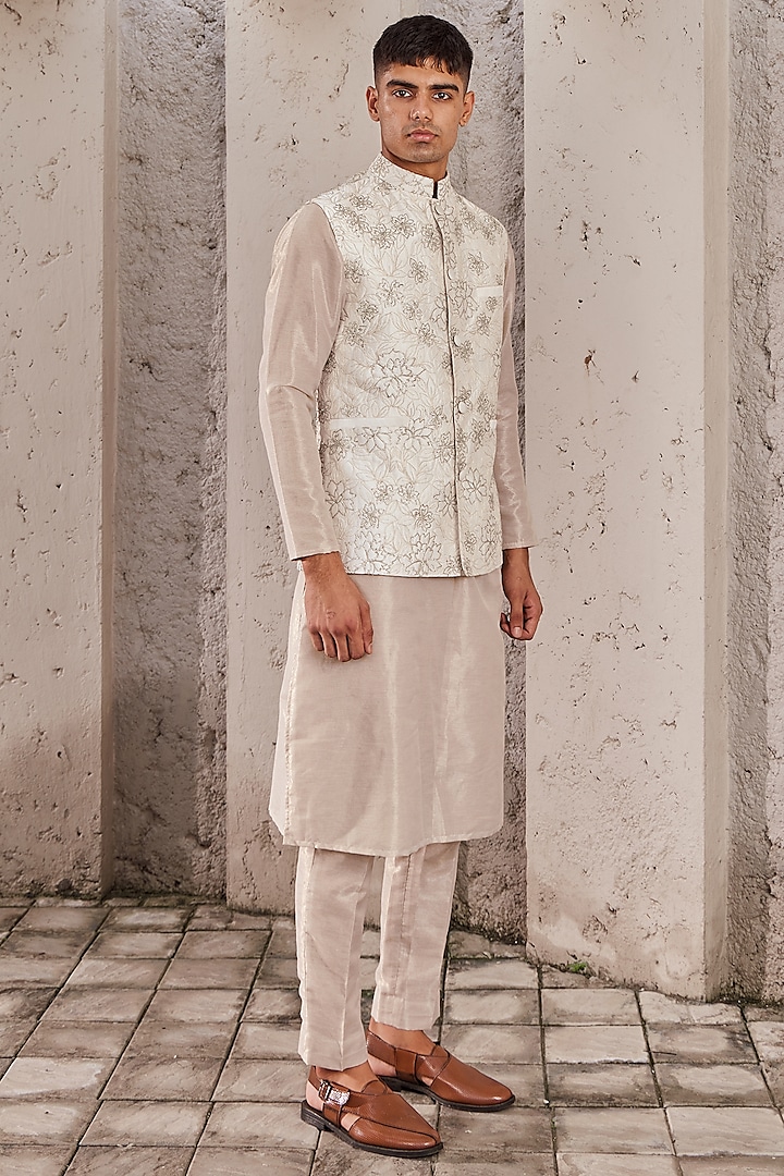 Ivory Silk Machine Embroidered Bundi Jacket Set by Nidhika Shekhar Men
