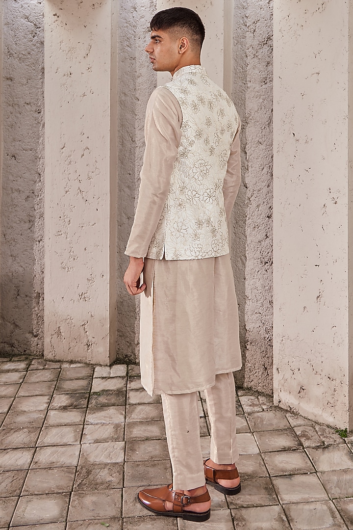 Ivory Silk Machine Embroidered Bundi Jacket by Nidhika Shekhar Men at Pernia's Pop Up Shop