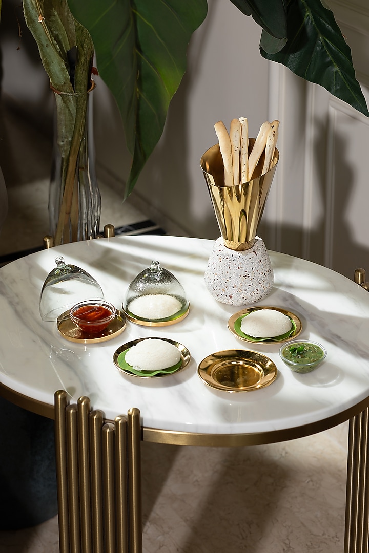 Gold Metal Plate With Mini Cloche ( Set Of 2) by HOUSE OF NEEBA at Pernia's Pop Up Shop