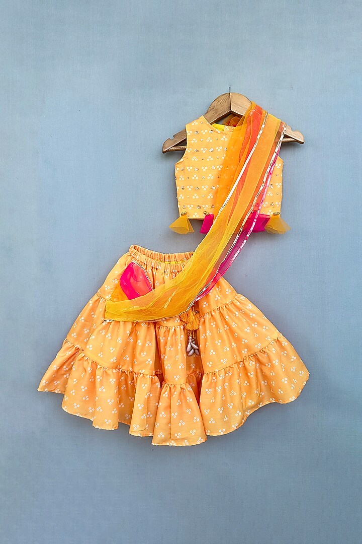 Yellow Muslin Bandhani Printed Layered Lehenga Set For Girls by Label Neeti at Pernia's Pop Up Shop