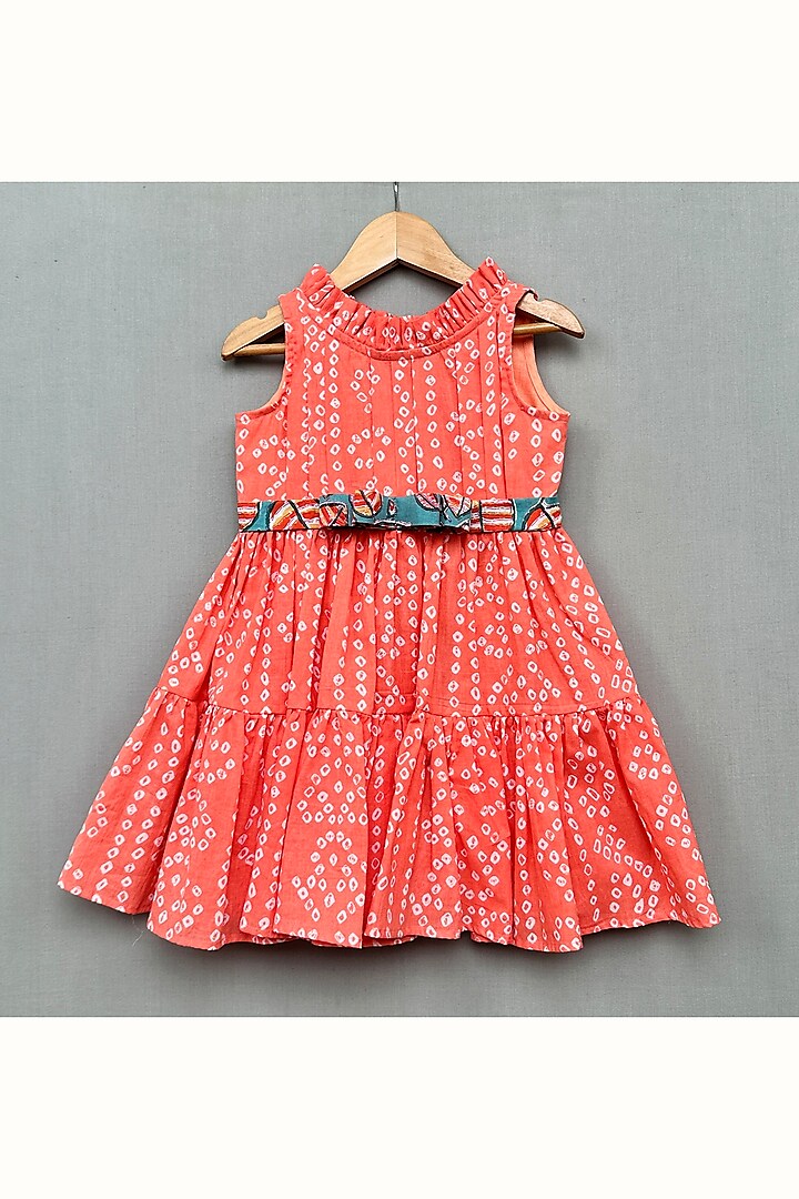 Peach Cotton Bandhej Printed Dress For Girls by Label Neeti at Pernia's Pop Up Shop