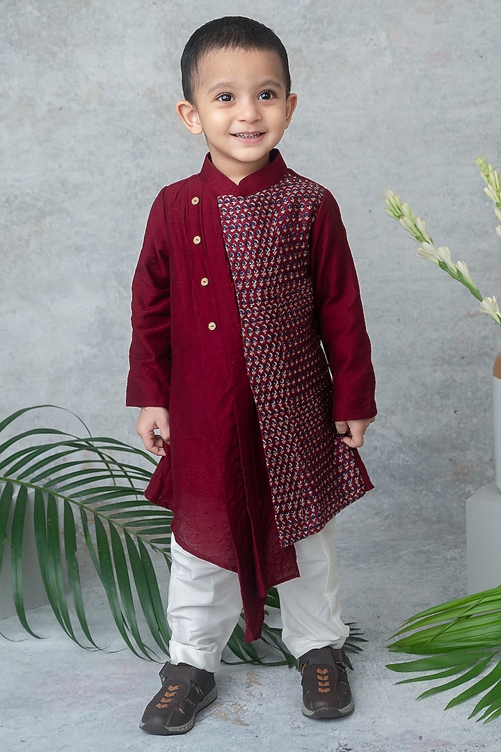 Maroon Dola Silk Hand Block Printed Asymmetric Kurta Set For Boys by Label Neeti at Pernia's Pop Up Shop