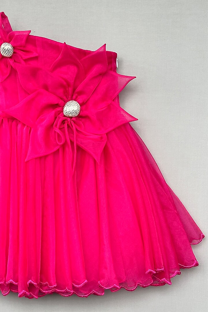 Fuchsia Organza Floral Applique Embellished One-Shoulder Dress For Girls by Label Neeti at Pernia's Pop Up Shop