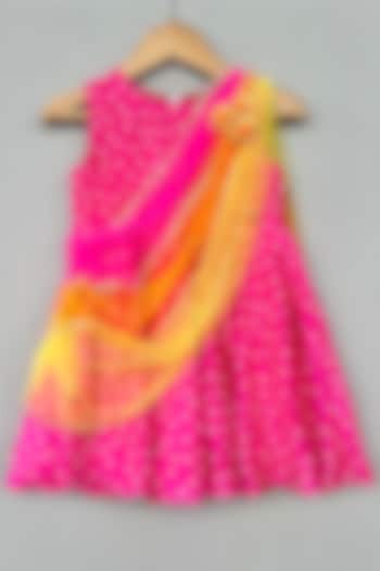 Rani Pink Muslin Bandhani Printed Draped Dress For Girls by Label Neeti at Pernia's Pop Up Shop