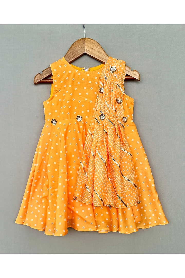 Yellow Muslin Printed & Embellished Dress For Girls by Label Neeti at Pernia's Pop Up Shop