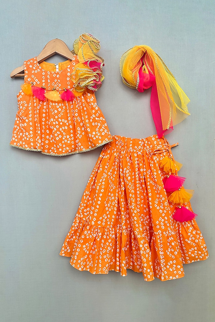 Orange Cotton Bandhani Printed Tiered Lehenga Set For Girls by Label Neeti at Pernia's Pop Up Shop