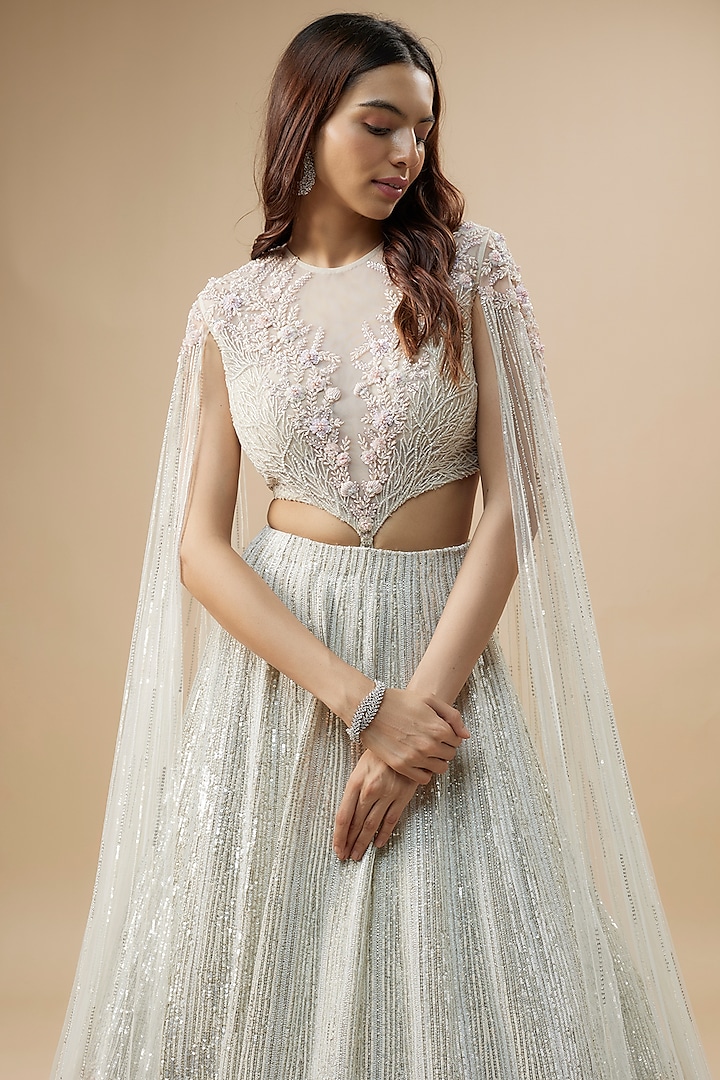 Ivory Net & Organza Floral Jaal Embroidered Bridal Lehenga Set by COUTURE BY NIHARIKA at Pernia's Pop Up Shop