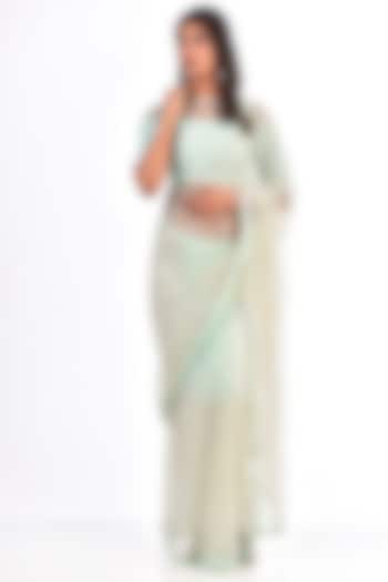 Powder Blue Net Cutdana Embroidered Reception Saree Set by COUTURE BY NIHARIKA at Pernia's Pop Up Shop