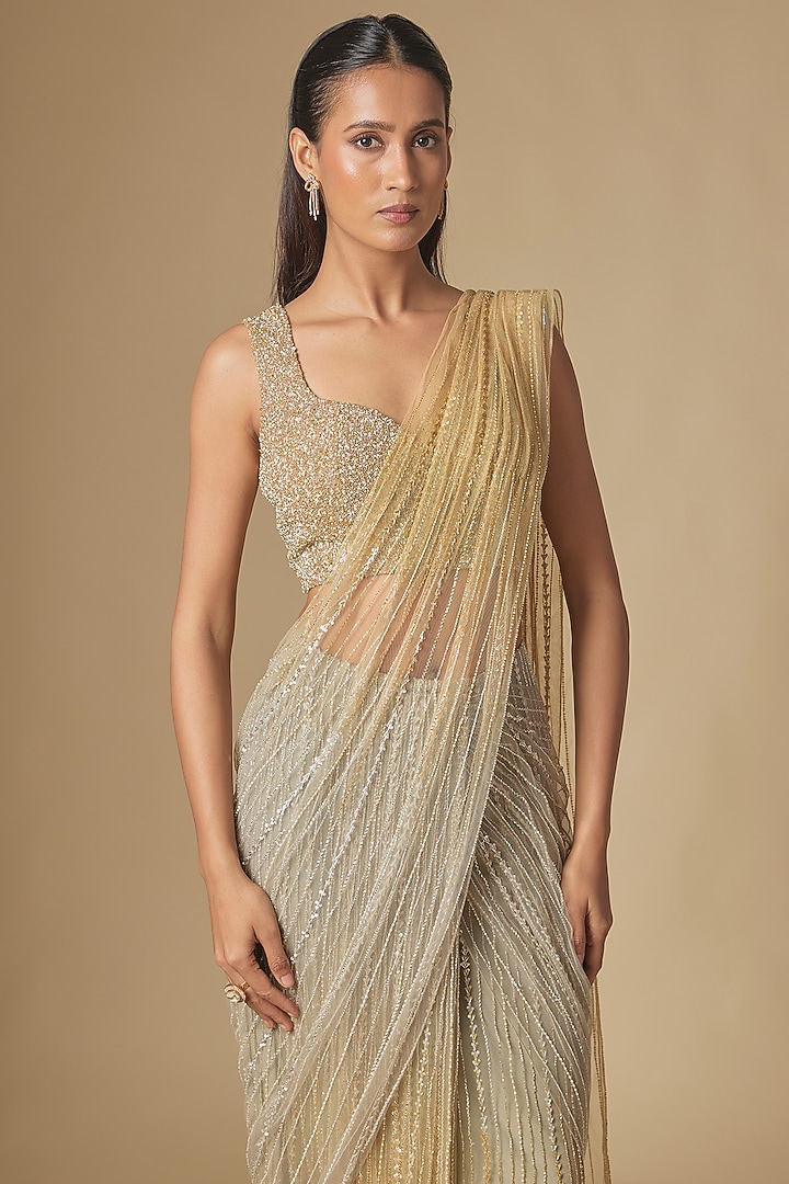 Grey & Gold Net Feather Embellished Reception Saree Set by COUTURE BY NIHARIKA at Pernia's Pop Up Shop