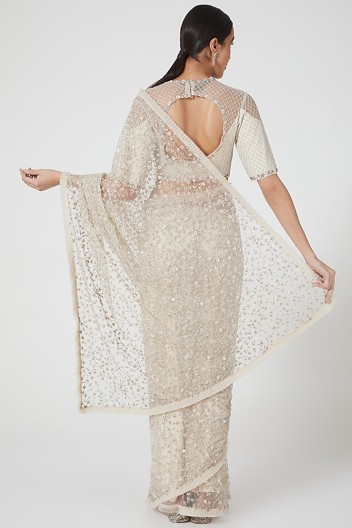 Ivory Georgette & Net Sequins Hand Embroidered Reception Saree Set by COUTURE BY NIHARIKA at Pernia's Pop Up Shop
