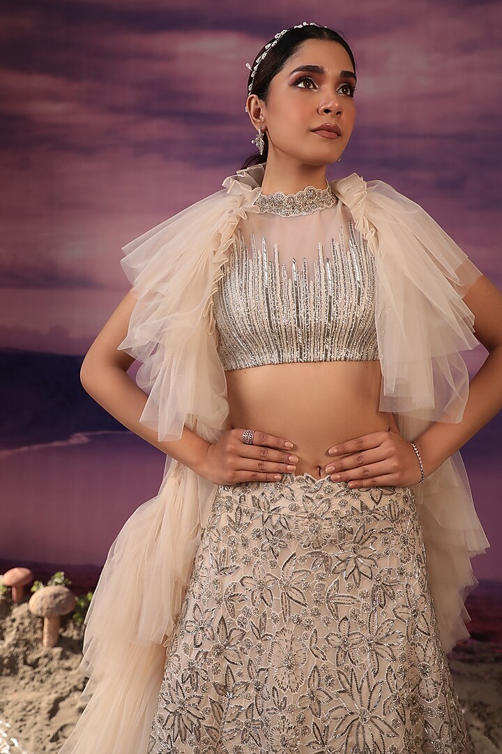 Ivory Organza & Net Cutwork Embroidered Wedding Lehenga Set by COUTURE BY NIHARIKA at Pernia's Pop Up Shop