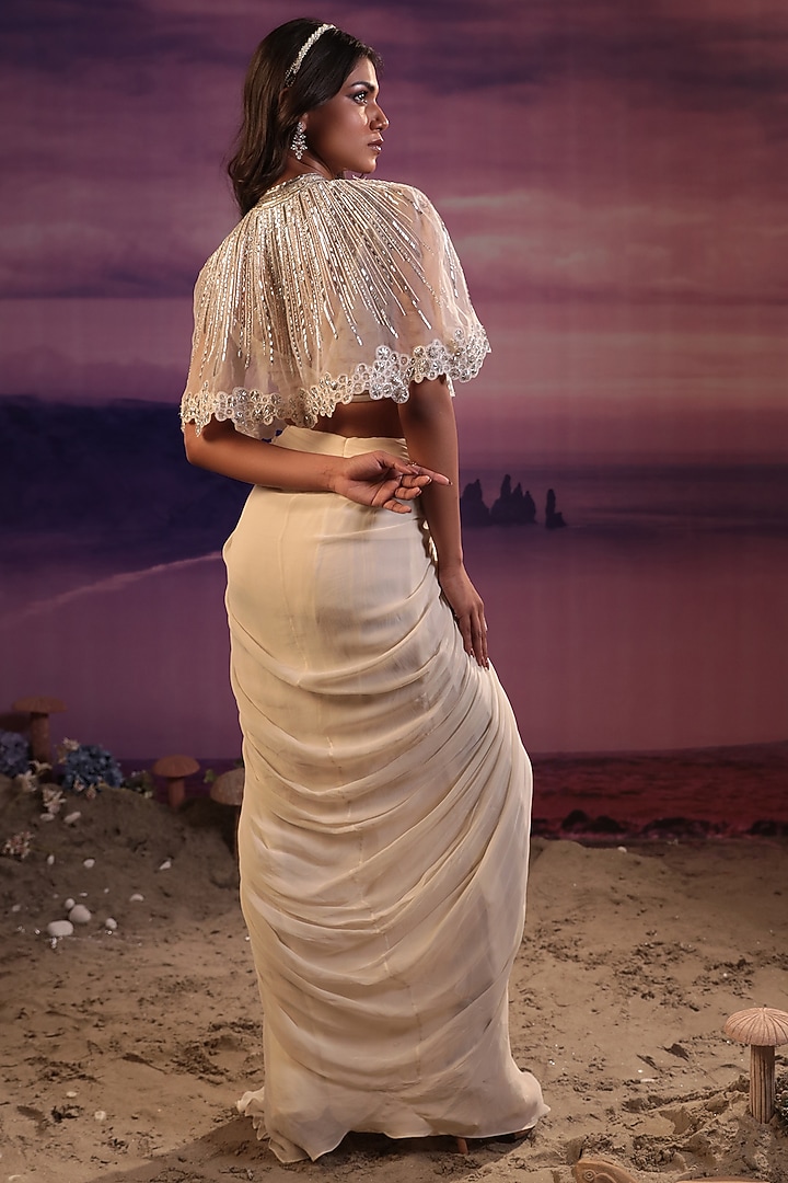 Ivory Viscose & Georgette Draped Skirt Set by COUTURE BY NIHARIKA at Pernia's Pop Up Shop