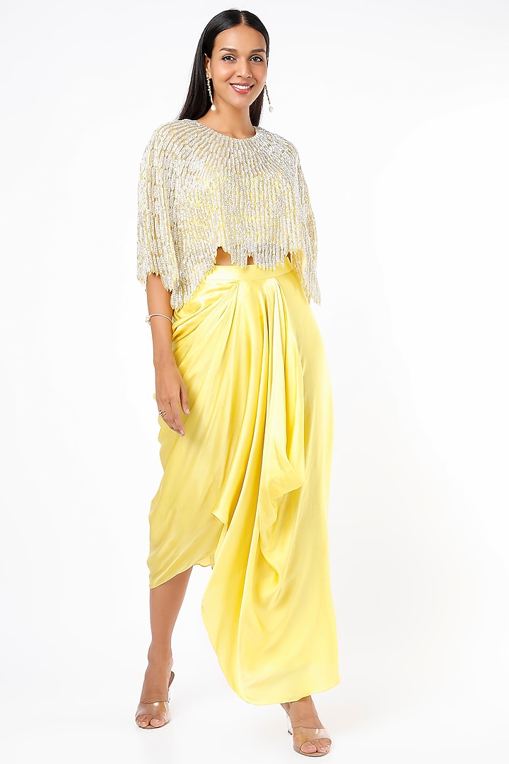 Mango Yellow Pure Satin Draped Skirt Set With Cape by COUTURE BY NIHARIKA