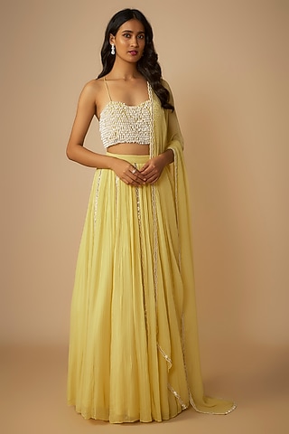 Yellow Viscose Georgette Lehenga Set by COUTURE BY NIHARIKA