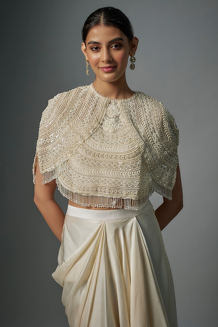 Ivory Organza & Satin Sequins Embroidered Cape Set by COUTURE BY NIHARIKA at Pernia's Pop Up Shop