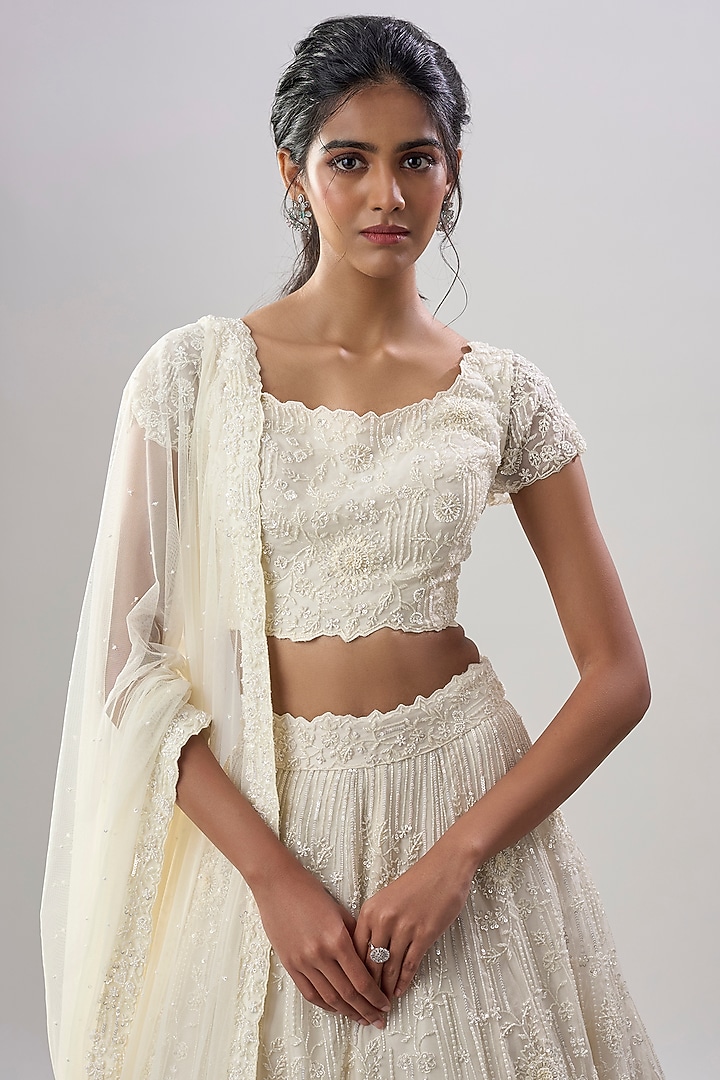 Off-White Organza & Net Embroidered Wedding Lehenga Set by COUTURE BY NIHARIKA at Pernia's Pop Up Shop