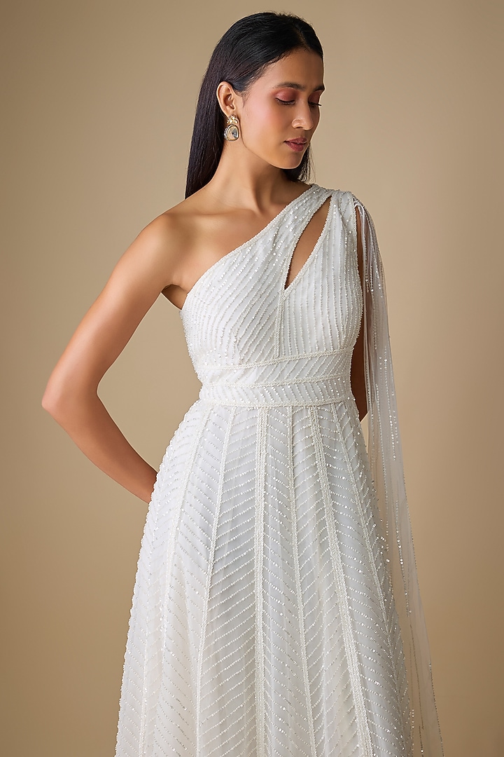 Ivory Net & Organza Sequins Embroidered Wedding Gown by COUTURE BY NIHARIKA at Pernia's Pop Up Shop