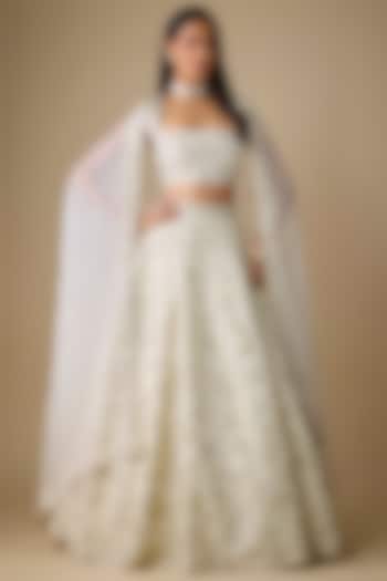 Ivory Silk Embroidered Bridal Lehenga Set by COUTURE BY NIHARIKA at Pernia's Pop Up Shop